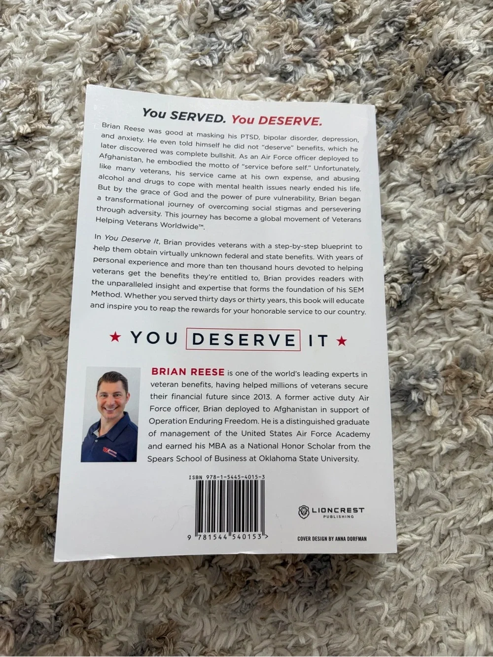 You Deserve It by Brian Reese - White Cover with Red & Blue Graphics